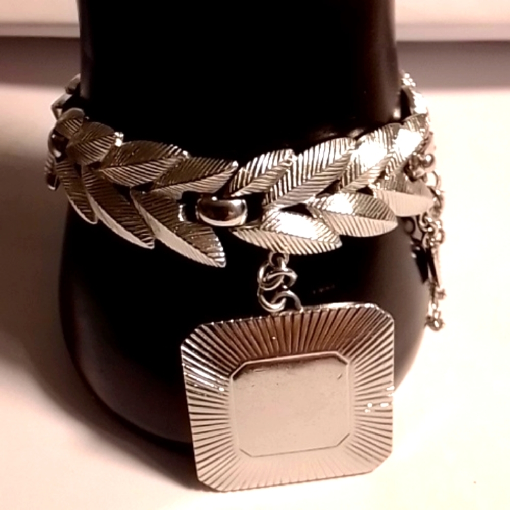 Monet silver tone leaf bracelet with dangle